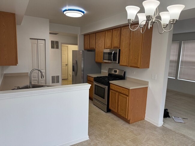 Photo - Partially Furnished - Bright & Spacious 2BR/1.5 BA CONDO - End-Unit w/ 2-Car Garage, Appliances, ...