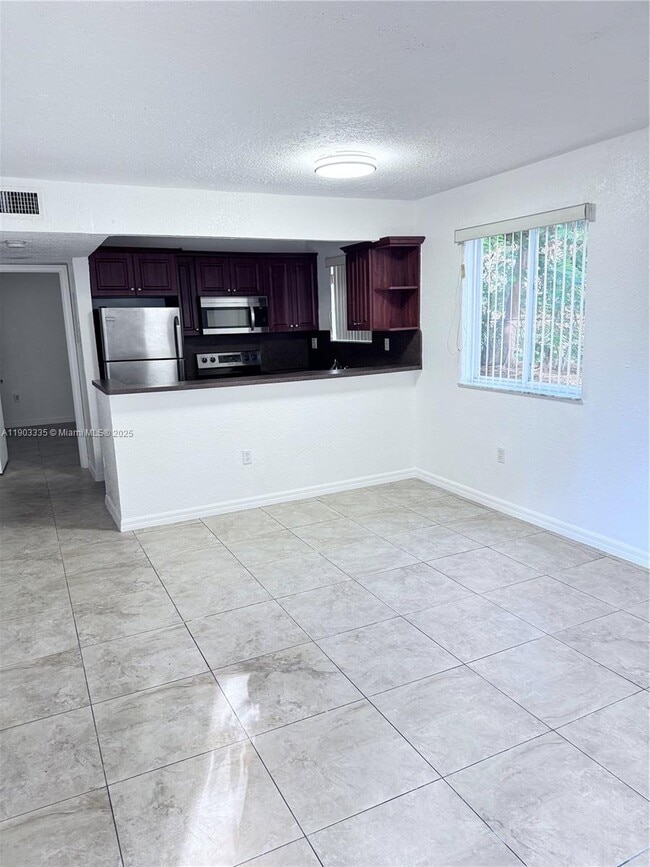 Building Photo - 6225 SW 131st Ct Unit 104
