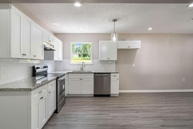 Photo - Updated 4 bedroom, 3 bath, single story ho...
