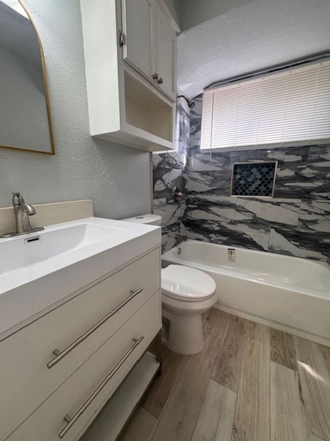 Photo - $300 off your move in by June 1st! Newly remodeled 3 bed 1 bath garage conversion with monitore...