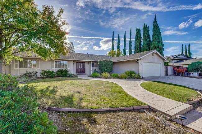 Building Photo - Nicely Updated 4BR 3BA Single Level Home i...