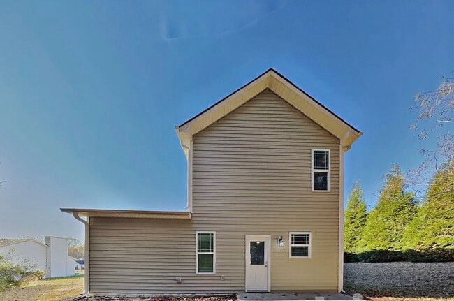 Photo - Spacious 3-Bedroom House with Cozy Living Spaces