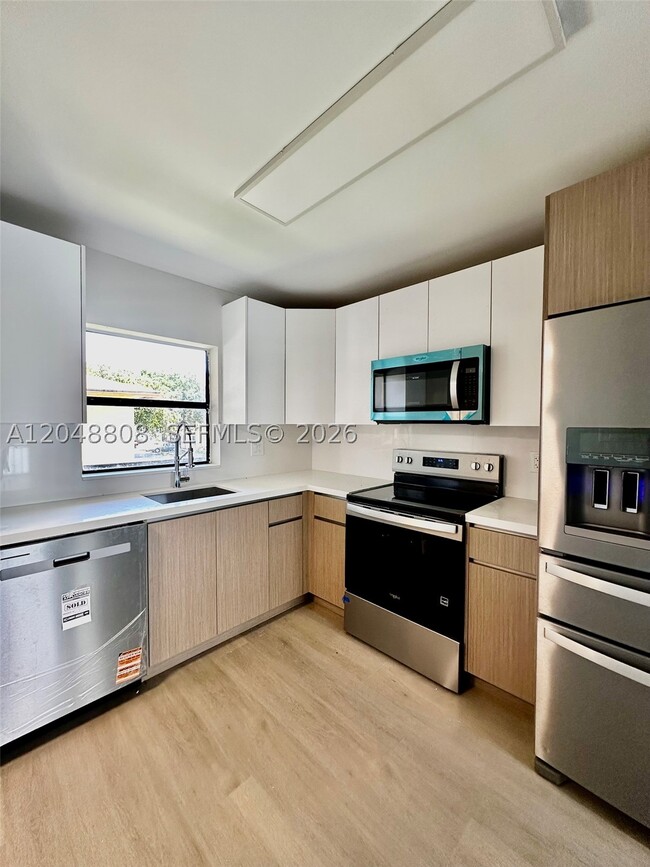 Building Photo - 2540 W 67th Pl Unit 202-28