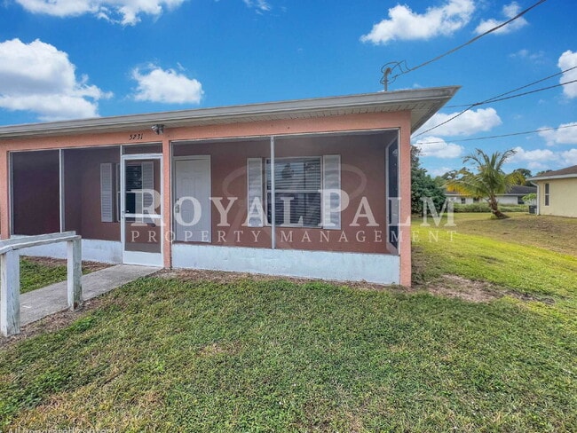 Photo - Your Duplex Dream Just Got Merrier! Charming 3-Bed, 2-Bath Home in Lehigh Acres!
