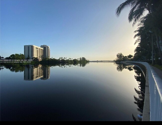 Building Photo - 5091 NW 7th St Unit 710