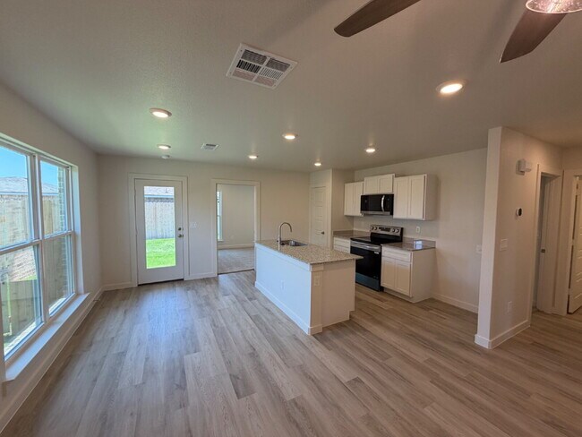 New Modern 3 Bedroom Home in Frenship ISD with Garage & Fenced Backyard