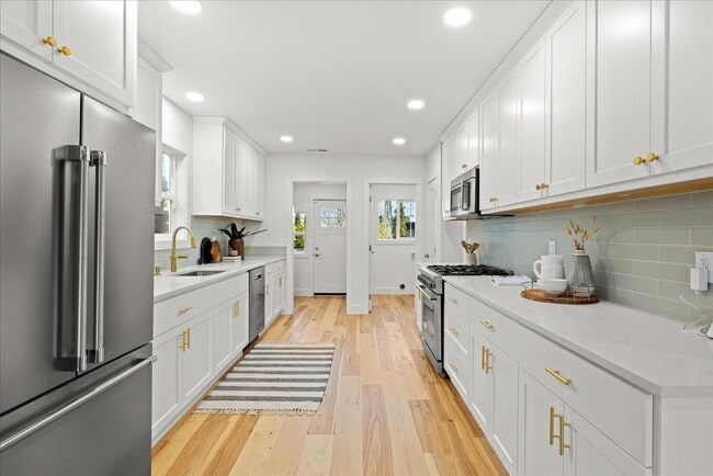 Photo - Beautifully Renovated 3-Bedroom Home with Private Fenced Yard Unit #A
