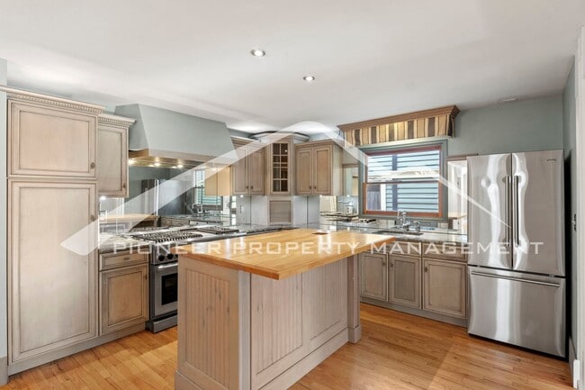 Photo - Charming 2-Bedroom + Office in the Historic Old North End, with access to 2 car garage spaces.