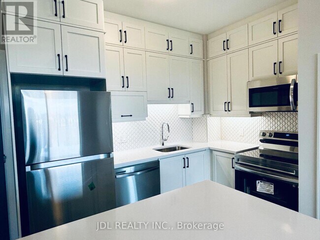 Photo - 3265 Carding Mill Trail Unité 323