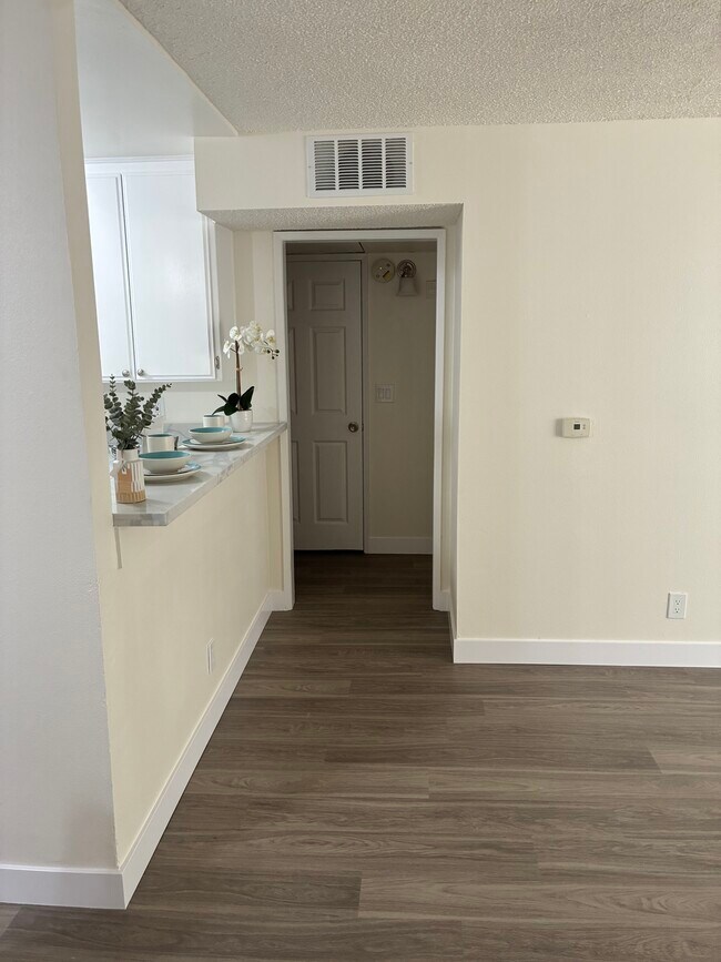 Kitchen countertop and 2nd bedroom halllway
