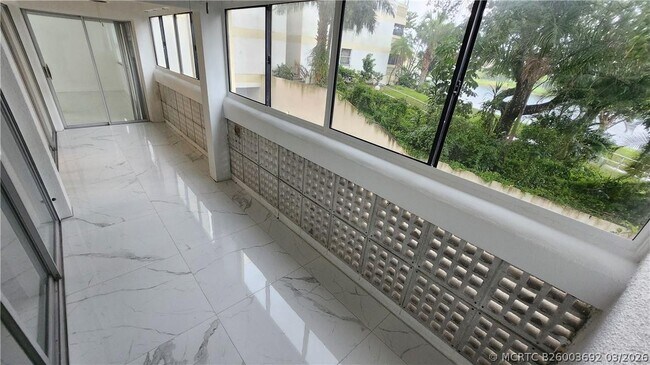 Building Photo - 3301 Spanish Moss Terrace Unit 202