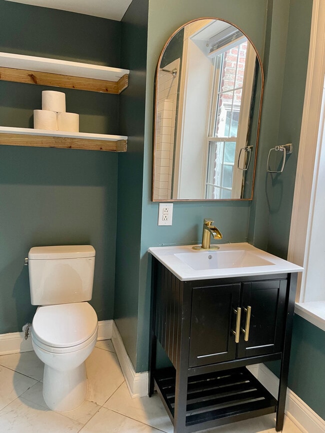 Bathroom sink/toilet area - 140 W Clay St Unit KING BEDROOM