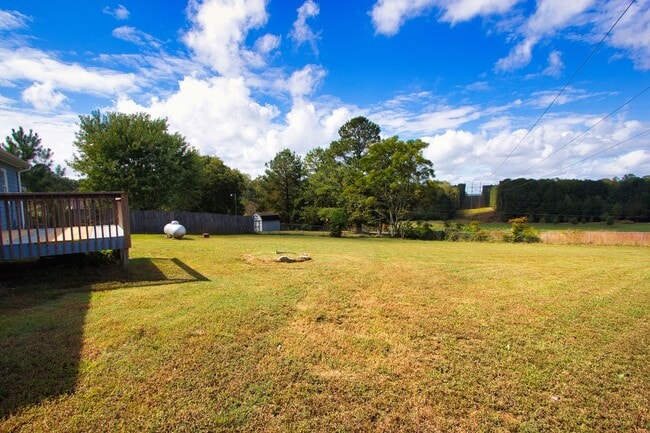 Photo - MOVE IN READY– Loganville Gem with Large Fenced Yard & Outdoor Living!