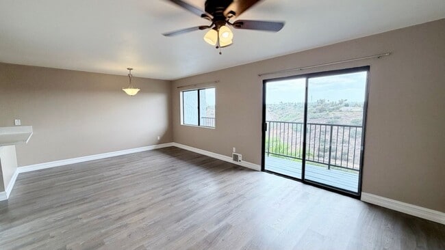 Building Photo - Bright 2BR Bay Park Townhome with Covered Parking & Canyon View Balcony