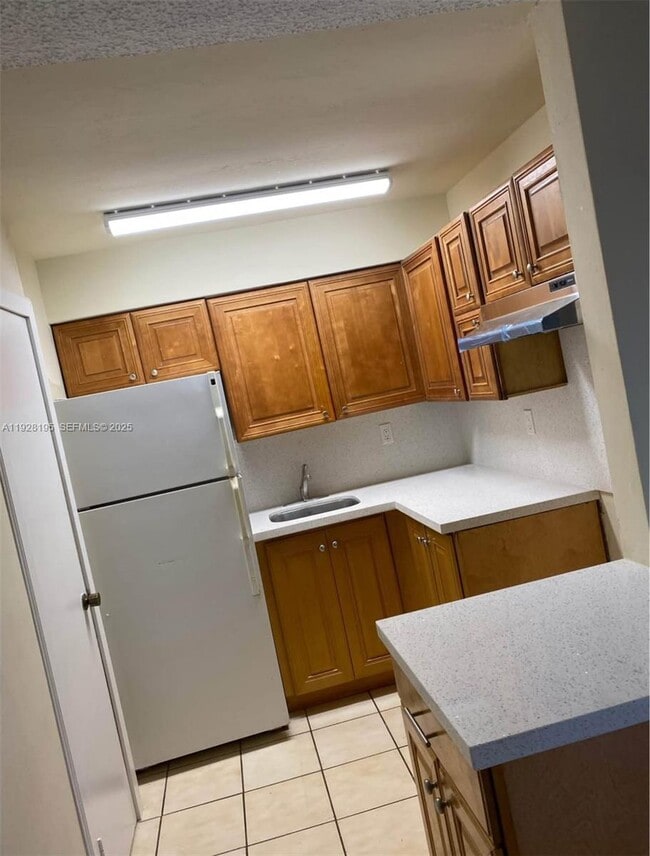 Building Photo - 8701 SW 141st St Unit G5