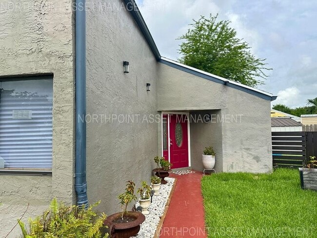 Photo - Charming 2BR 2BA Home w/  Full Appliance Suite • Fenced Yard • Driveway Parking in Miramar