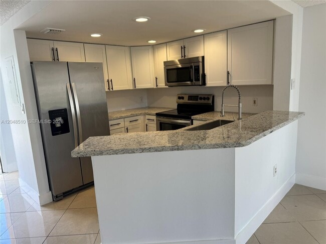 Building Photo - 5200 NW 31st Ave Unit 150