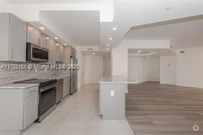 Building Photo - 19500 Turnberry Way Unit # 6E Rental