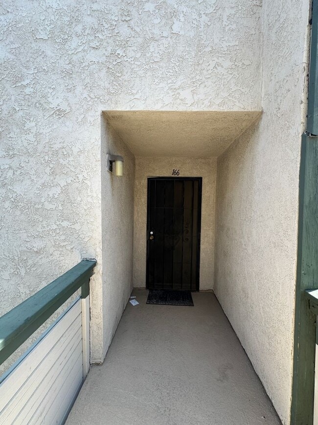 Building Photo - Coming Soon: Stylish 2-Bedroom Condo in a Gated Community with Pool Access