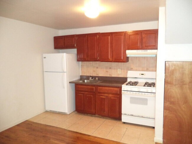 107-53 Remington St