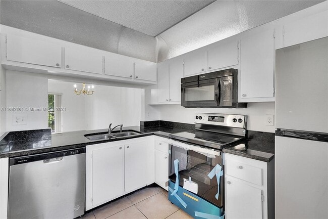 Photo - 855 NW 103rd Ter Unit #201 LIKE NEW UPDATED