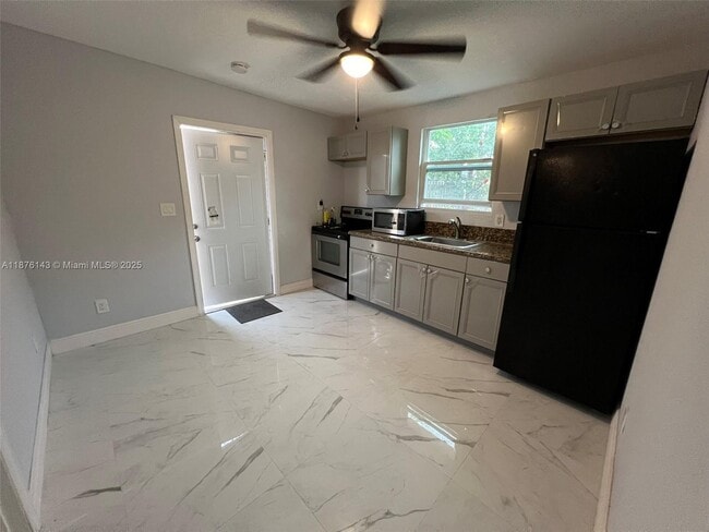 Building Photo - 6980 SW 26th St Unit 1 Rental