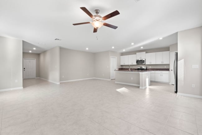 Photo - "Spacious 5-Bedroom Retreat in Apollo Beach - Modern Living with 2.5 Baths on White Chicory Dr!"