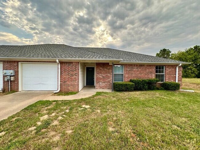 Newly Updated 3BR/2BA Corner Duplex in Lindale ISD! Fenced Yard & 1 Car Garage!