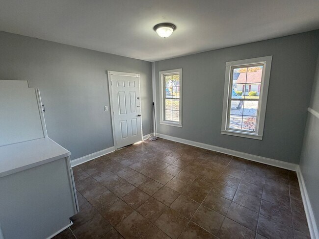 Photo - Remodeled bathrooms, new kitchen in this N...