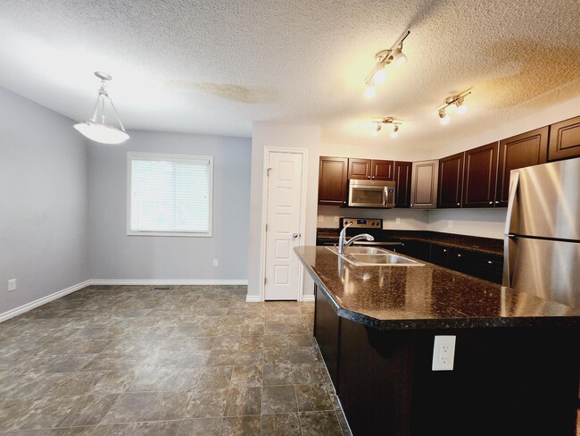 Photo - 21912-21990 90 Ave NW