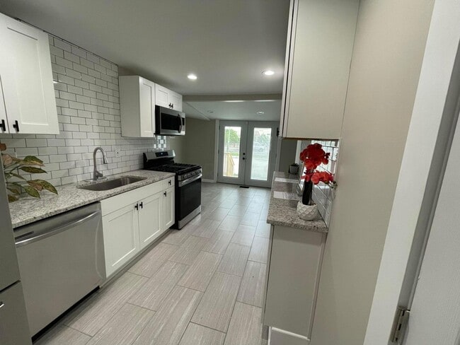 Photo - Half-Off 1st Month’s Rent! | Renovated 2BR Home + Bonus Room