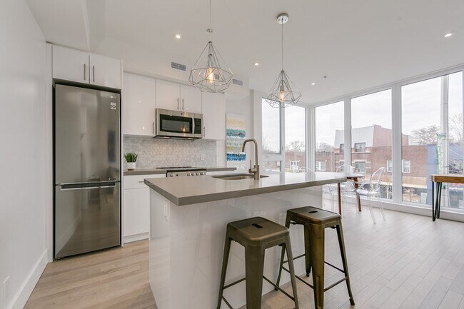 Photo - Bright 1.5 Bed + 1 Bath: $500,000 purchase... Unit E