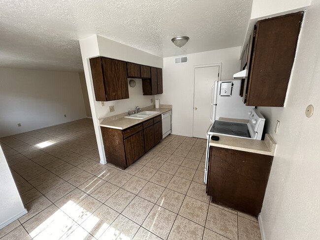 Kitchen - 1038 Texas St NE Apartments Unit A