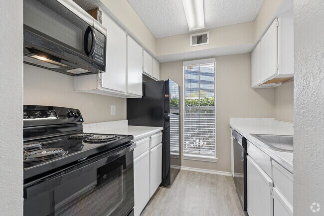 2BR, 2B.5BA - 1,065SF - Kitchen - Villas of Bent Trails