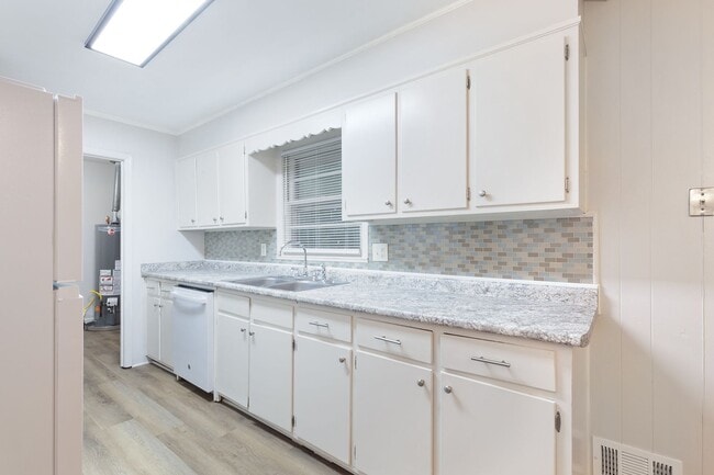 Photo - Newly Renovated 3bd/2ba Home w/ Sunroom and Large Backyard in Great Location!