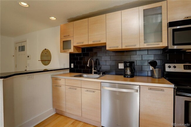 Photo - LOCATION LOCATION!! Open and spacious corner unit that offers abundant natural light and is conve... Unit 305