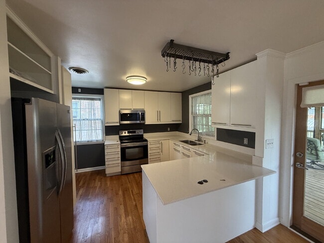 Photo - Updated 3 bed 2 bath. Garage and screened porch