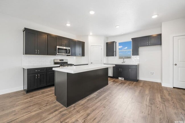 Building Photo - Beautiful New Build Townhome with Attached...