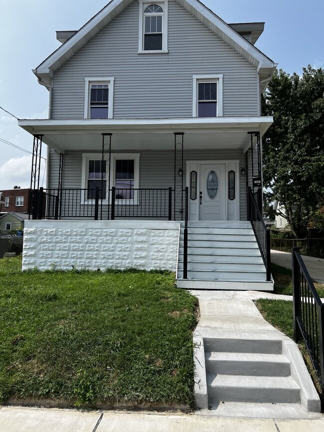 Building Photo - 1337 Poplar Ave Rental
