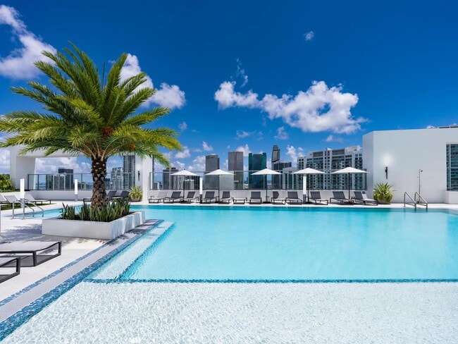 Bask in the sun and skyline views from Modera Riverside’s rooftop pool deck. - Modera Riverside