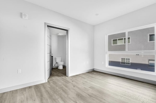Building Photo - 7040 Woodman Ave Unit 207