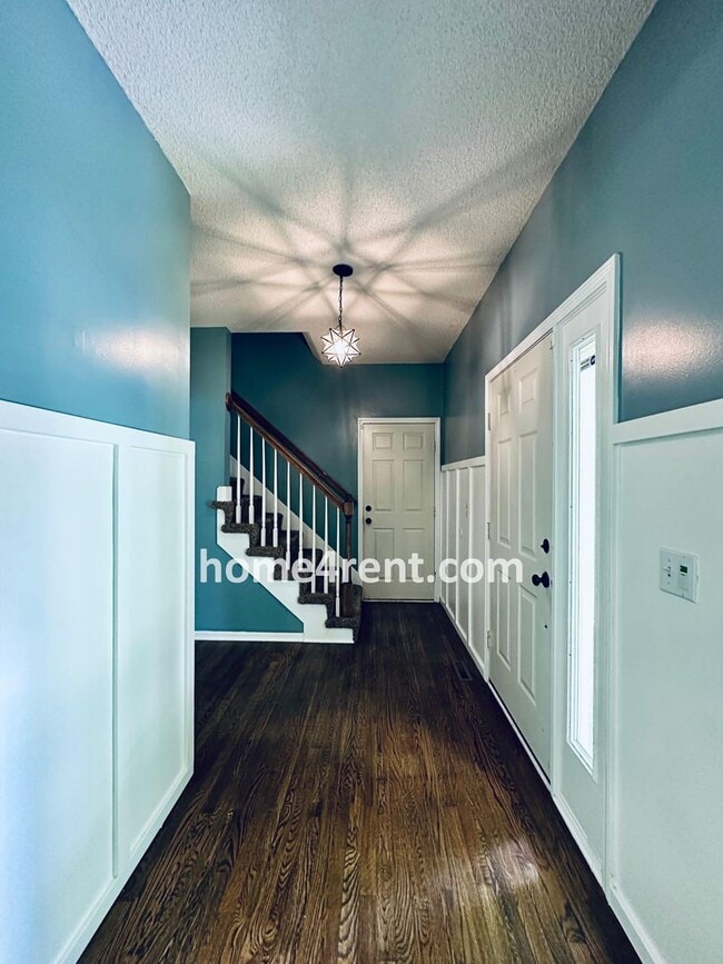 Photo - Blue Valley Schools w/ Wood Floors, Finished Basement and a Peaceful, Private Fenced Yard!