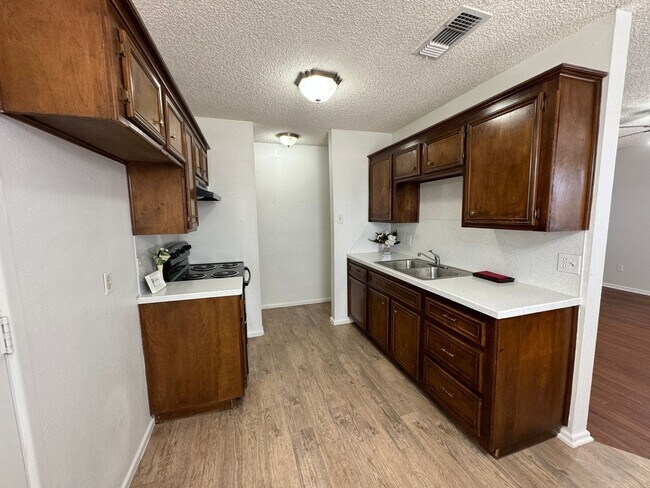 Photo - DS LO 8212 Vernon Avenue Unit A