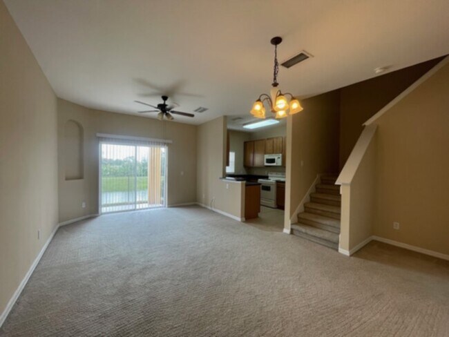 Photo - Spacious Gated Townhouse with Garage, Community Pool, and More!