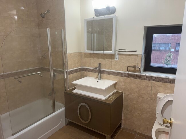 Building Photo - 10602 Astoria Blvd Unit 31-09 A