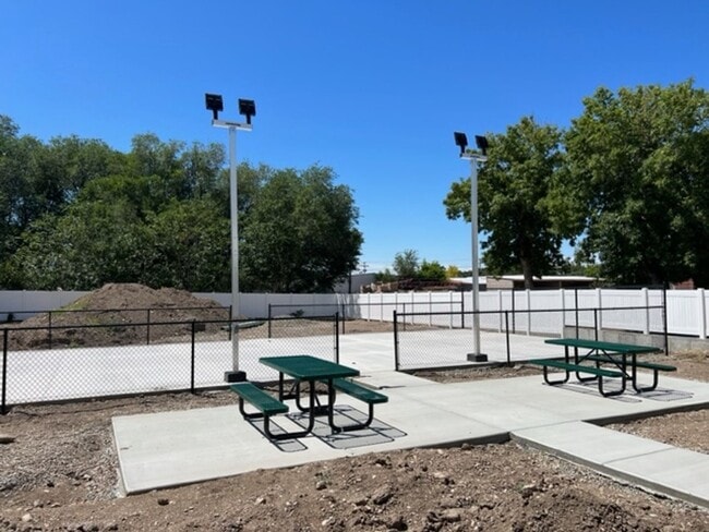 Photo - Beautiful home with pickle ball court, 2 car garage and central air