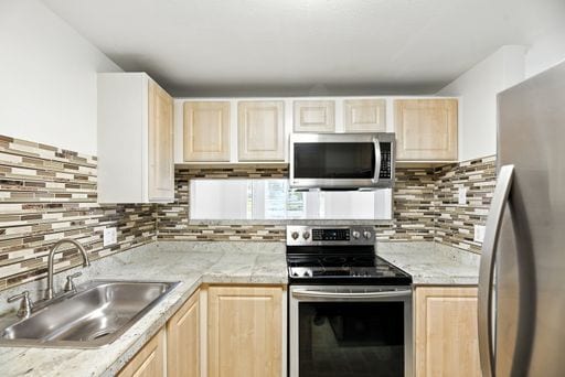 Building Photo - New Price! Convenient 1 bed condo is desir... Unit H228