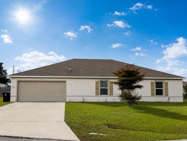 Building Photo - 5363 NW Perez Ct