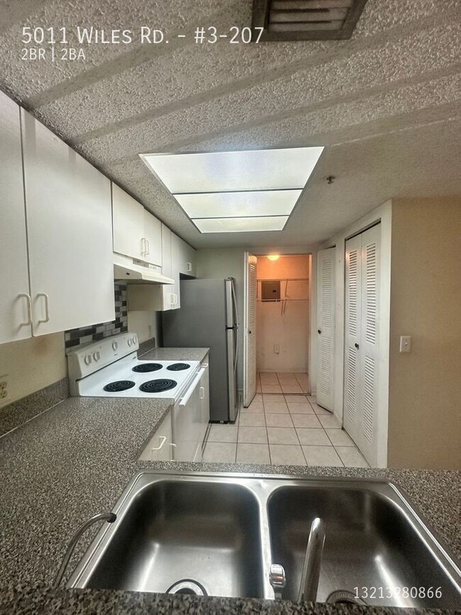 Photo - 5011 Wiles Rd Unidad #3-207