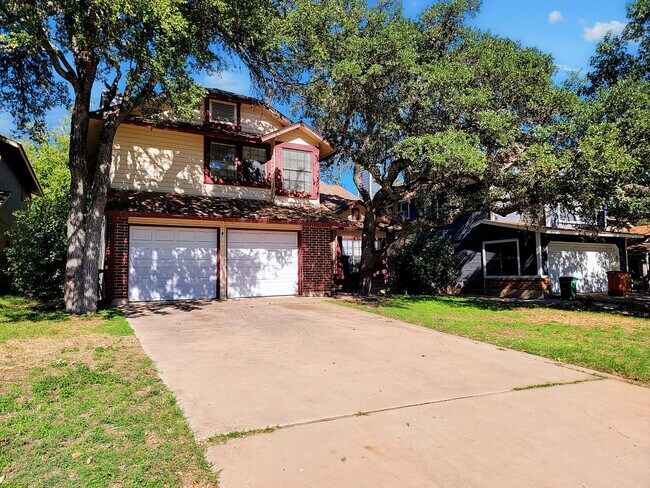 Photo - Warm & Inviting 4BR / 2.5BA Home with Covered Deck and 2-Car Garage